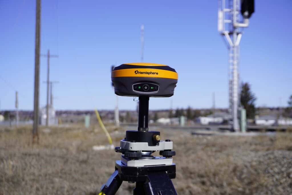 GNSS receiver mounted on tribrach and tripod for precise survey setup